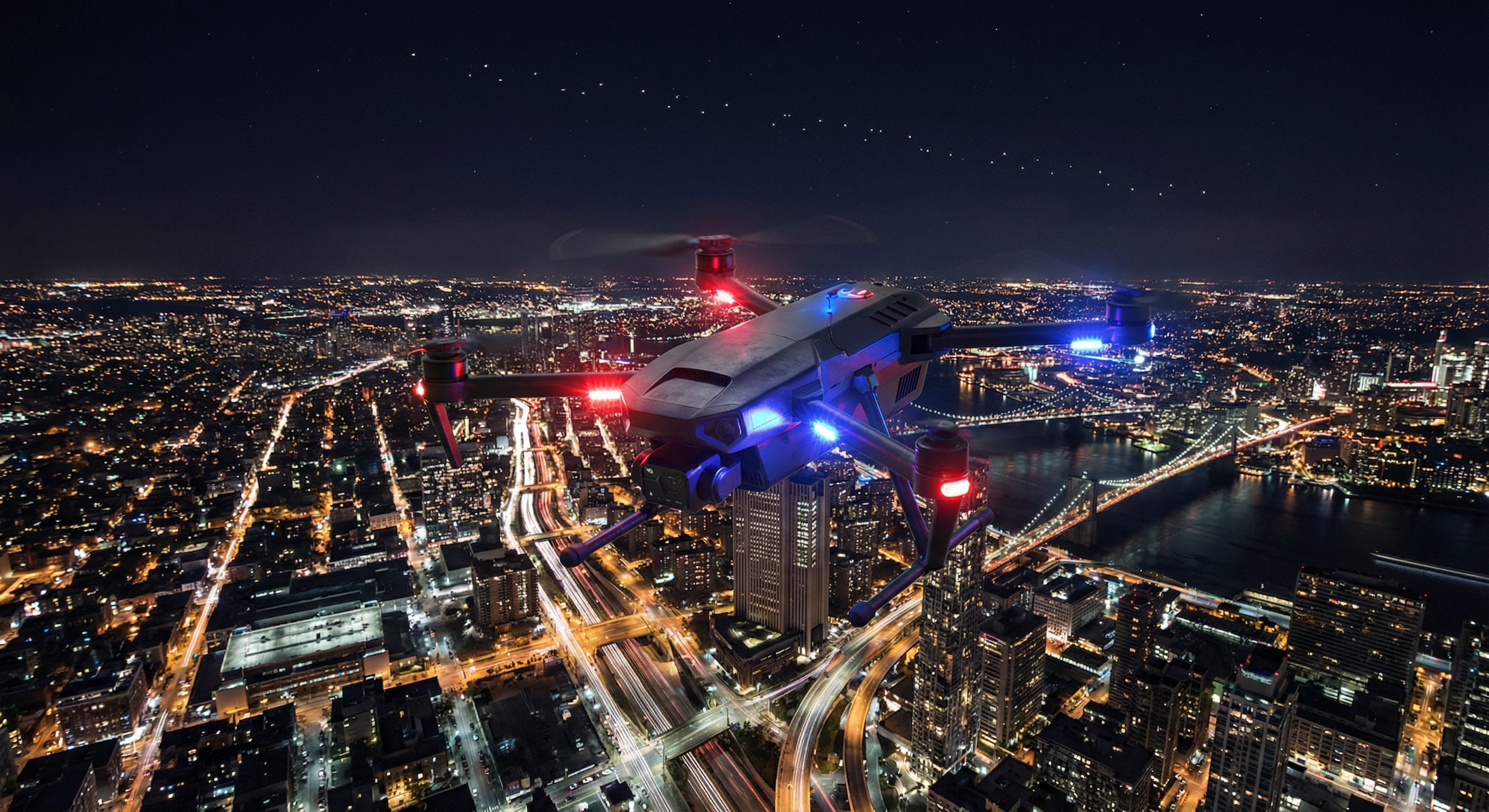 Tactical police drone with Starlink connectivity over nighttime cityscape